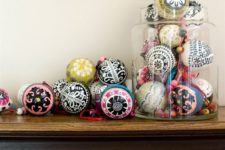 20 fun and whimsy ornaments displayed in a jar