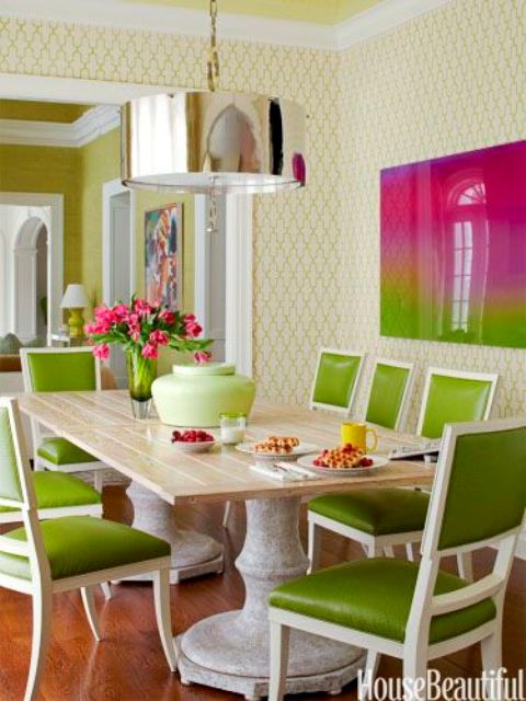 greenery upholstered chairs and a bold artwork will spruce up any dining space
