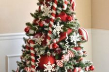 21 red and white Christmas tree with oversized balls and candy canes