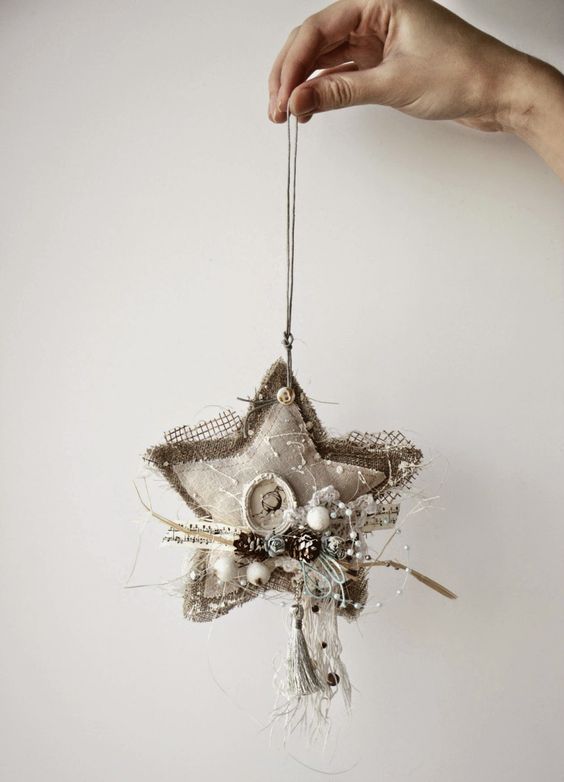 shabby chic star-shaped ornament with pinecones and beads