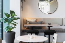 23 neutral modern decor, round tables and potted plants