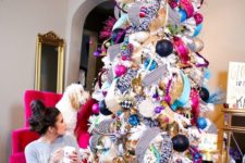23 whimsy tree made of deco mesh and ornaments of all colors