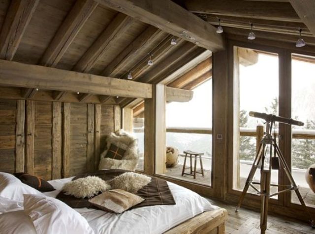 chalet bedroom with track lights to make the space illuminated