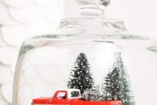 24 vintage snow globe with a pick up and tiny trees