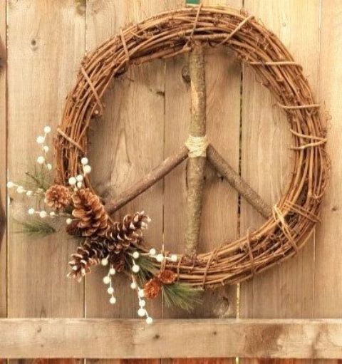 vine Christmas wreath styled as a peace sign