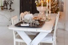 25 whitewashed picnic table and chairs, a contrasting black wardrobe