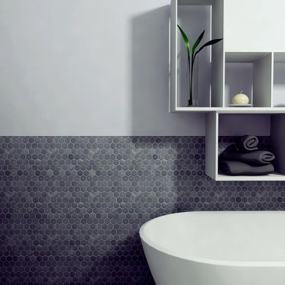 dark hexagon tiles for a bathroom backsplash works well even without border tiles