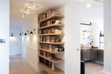 27 modern hallway and a bookshelf accentuated with lights