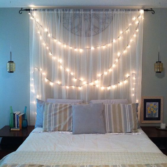 curtain headboard with hanging lights