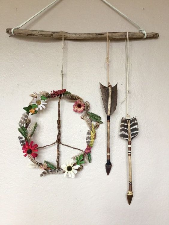 boho wildflowers peace wreath and arrows hanging