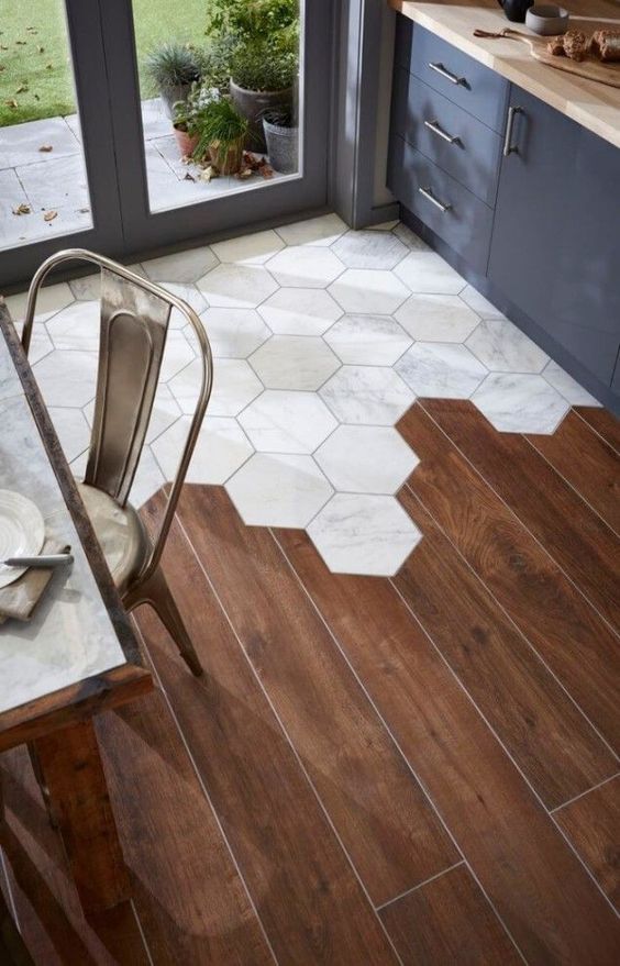 hardwood floors combines with hex tiles are an eye-catching design feature