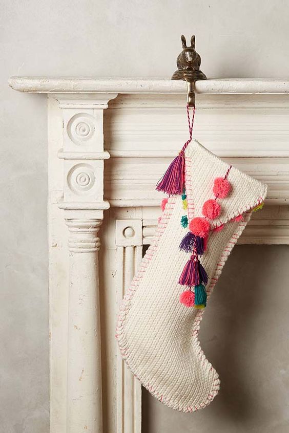 knit stocking with colorful pompoms