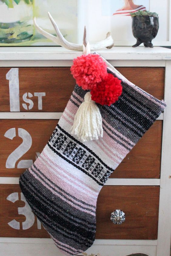 blanket stocking with pompoms