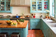 35 red hex tile floors contrast with turquoise cabinets