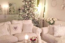 38 shabby chic pink and ivory living room with a large tree in the same shades