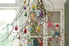 39 branches with colorful ornaments and pompoms