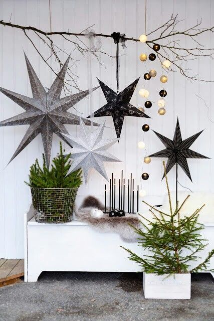 giant black, white and grey stars for decorating a modern space