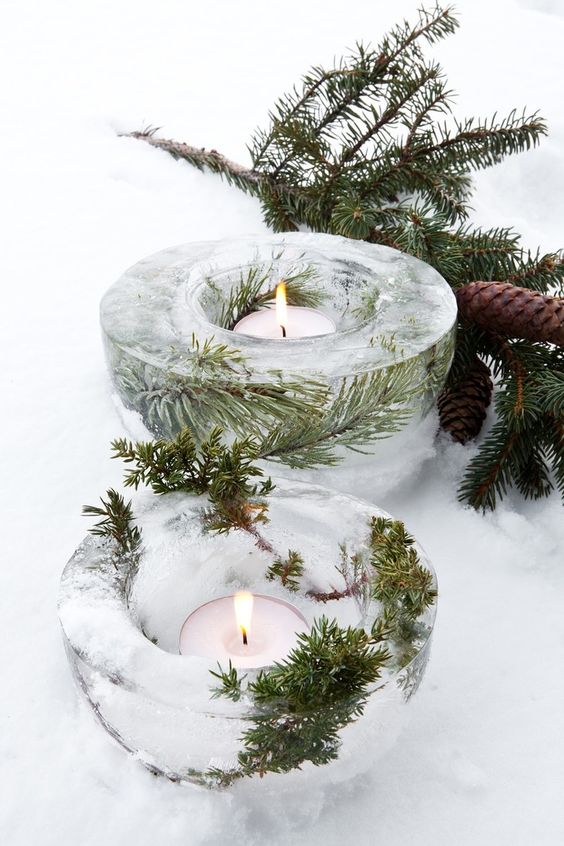ice candle holders with fir sprigs inside may be made by yourself