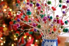 43 white branches with colorful pompoms