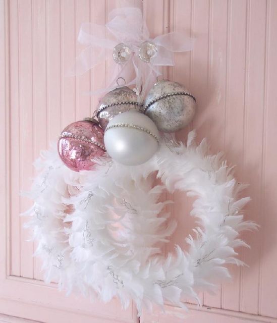 white feather wreath with vintage pastel ornaments