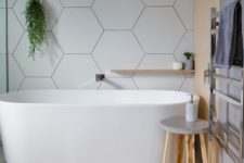 large format hex tiles work well in minimalist bathrooms
