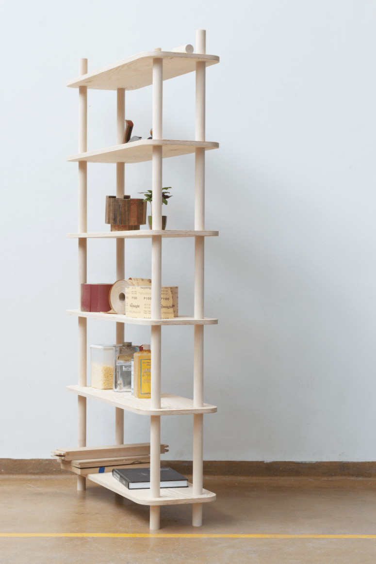 TS1 is a modern modular shelving system on wooden rods is easy to assemble and disassemble