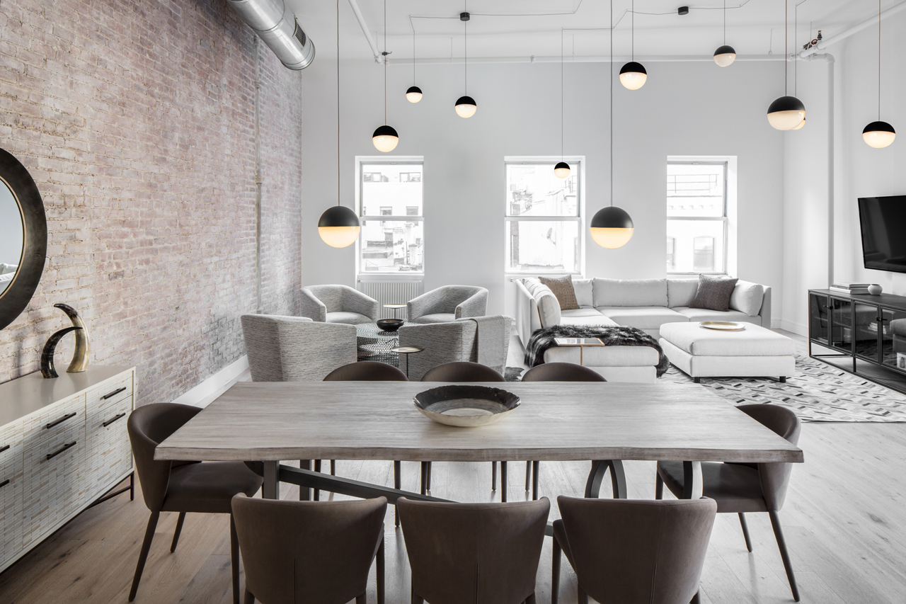 This modern industrial loft is decorated in calm and peaceful shades like light grey and taupe