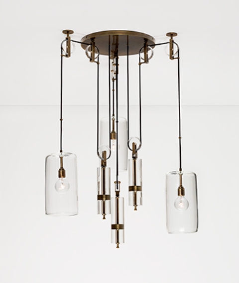 The chandelier is a cool industrial piece of glass and metal, its a little asymmetrical design catches an eye