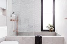 02 rectangular concrete bathtub looks great with marble tiles