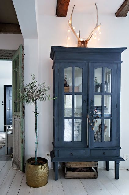 Vintage indigo colored glass armoire