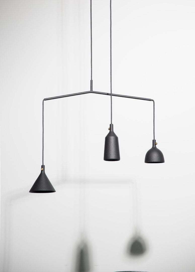 This lamp has an eye-catchy asymmetrical design and comes in timeless black