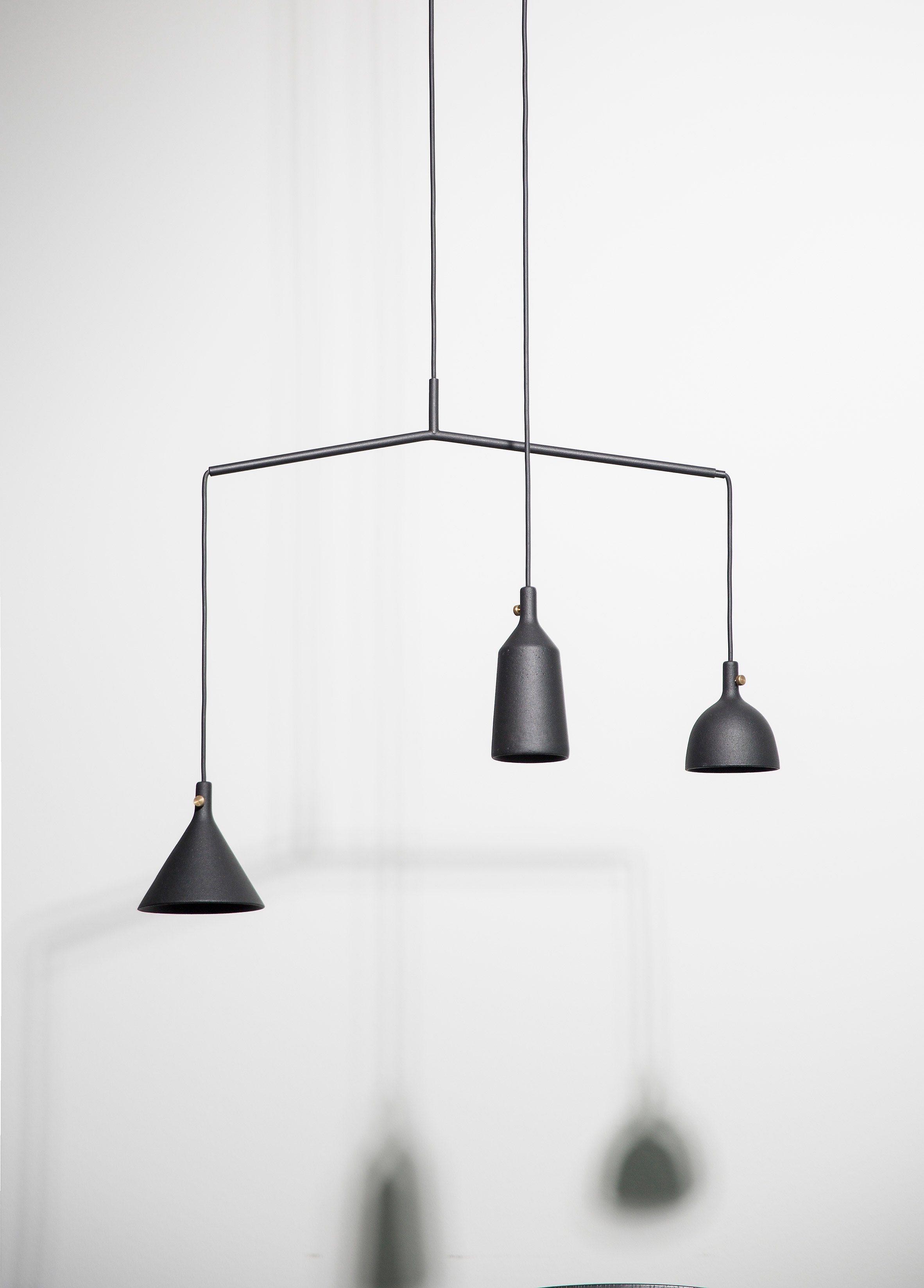 This lamp has an eye catchy asymmetrical design and comes in timeless black