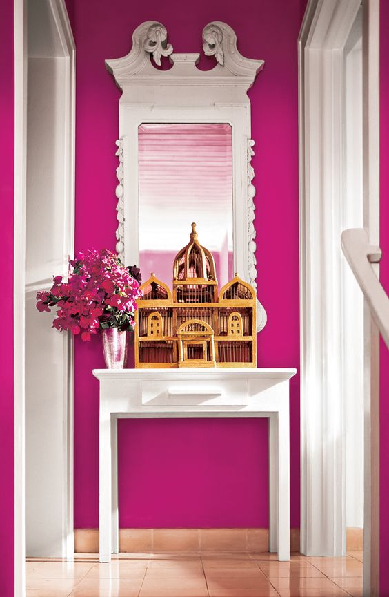 a whimsy girlish entryway done in fuchsia color