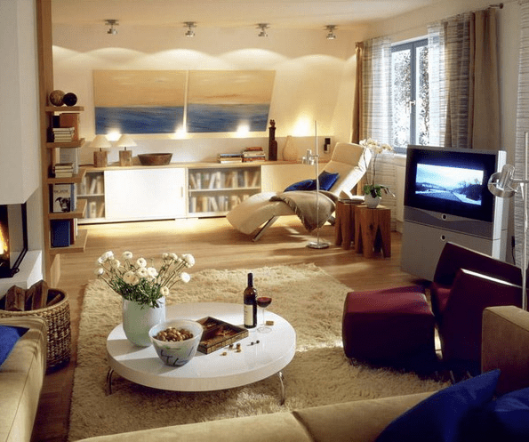 cozy sitting nook with two sofas and a chair on the side