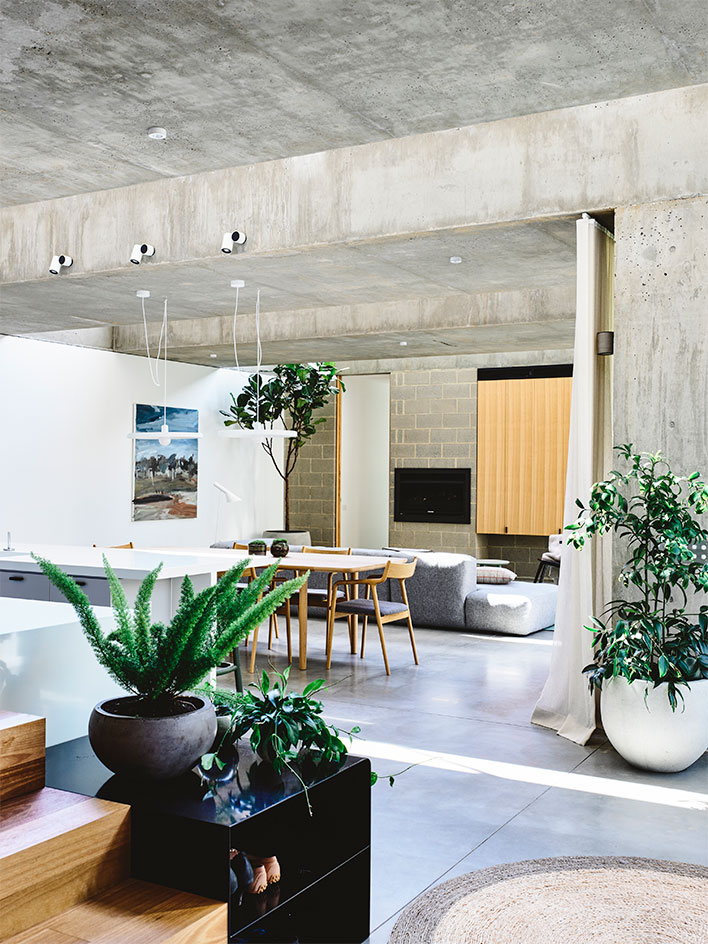 Despite of the extensive use of concrete, the interiors are very cozy