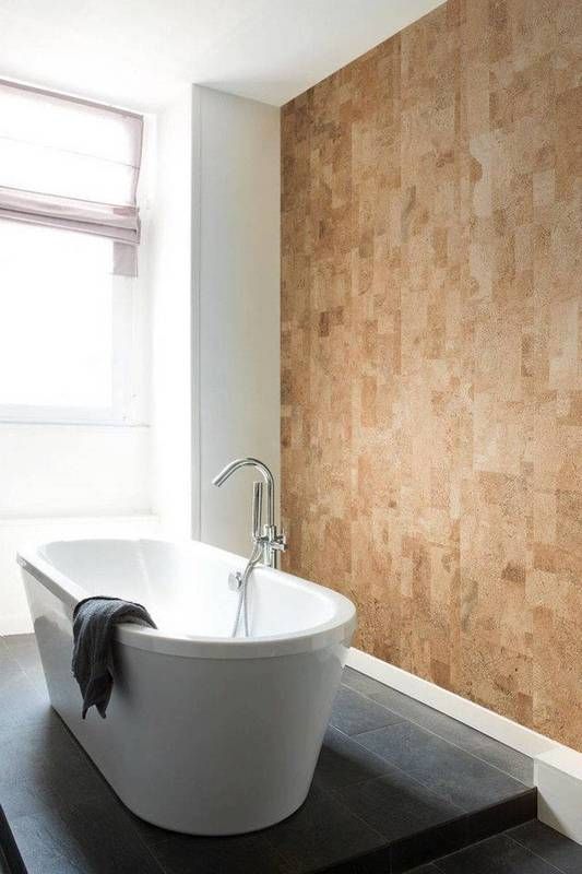 a cork wall looks textural and chic while being budget-friendly