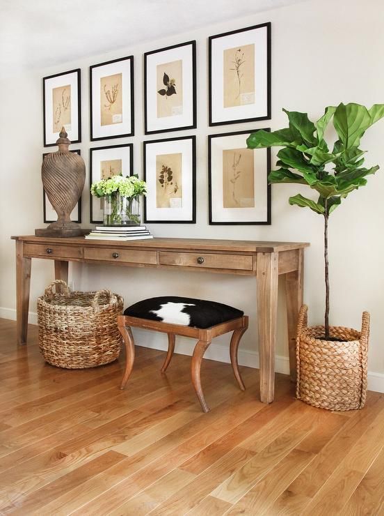 long and narrow light wood console table with drawers