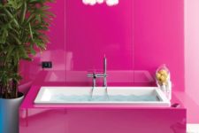 05 modern girl’s bathroom, walls and the bathtub covered with fuchsia panels