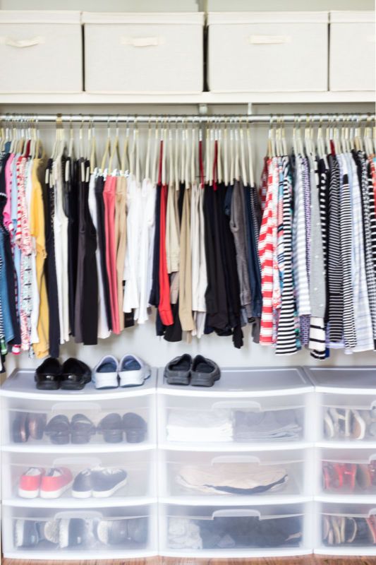 plastic boxes for shoes will keep them clearly seen, declutter your closet and they will take less floor space