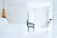 all white airy bedroom