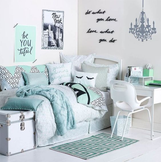 glam dorm room done in turquoise and aqua shades, with calligraphy