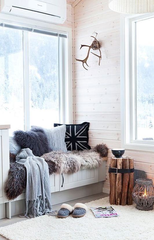 a window sill with a radiator hidden inside can be a perfect place to curl in