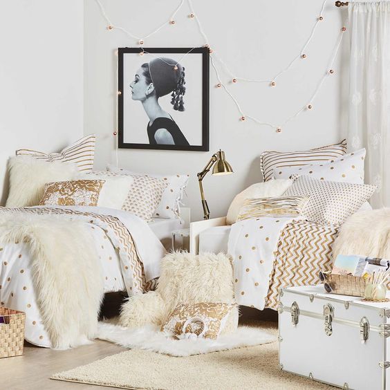 glam dorm room done with sophisticated metallics and enamel accents