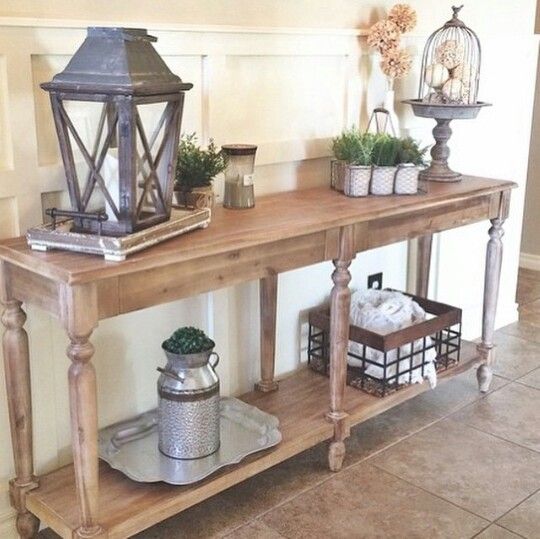 rustic war-colored wood console table with a shelf