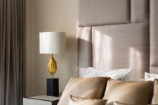08 darker taupe shade on the upholstered oversized headboard and curtains for a refined look