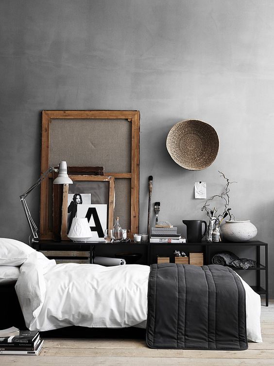 modern masculine bedroom with a concrete wall