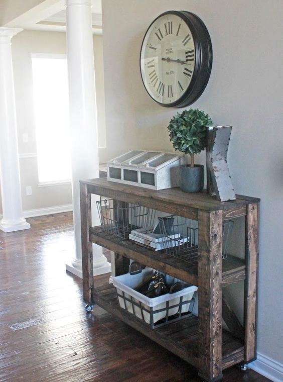 such three-tiered wooden console can be easily DIYed for your entryway