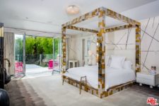 10 The bed is a focal point in this bedroom, it’s done in silver and gold geometric patterns