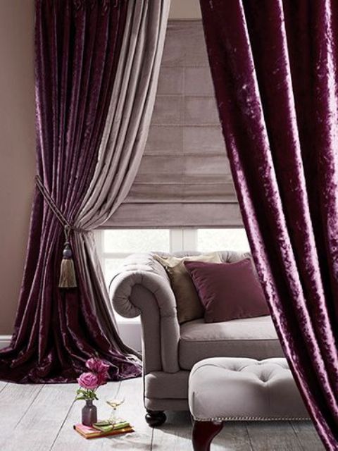 deep purple velvet curtains create a mood in this room