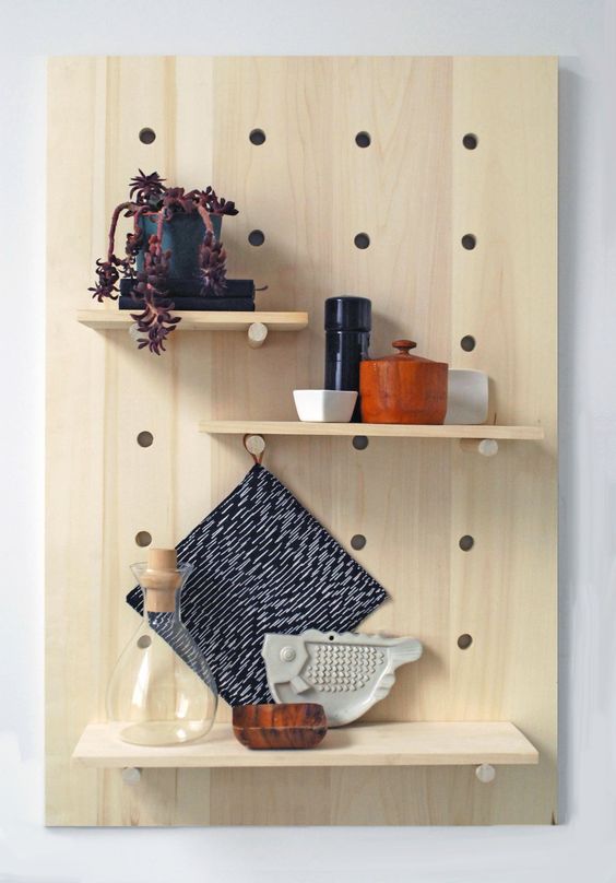 modern pegboard shelving system for storing spices